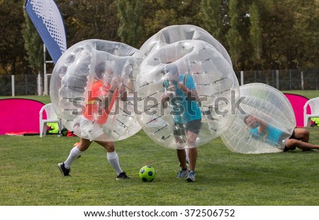 Close up view of bubble football balls game.