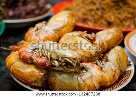 Delicious and tasty big size shrimp served on a plate. The size and the color of the shrimp is very seductive and arousing the ate appetite