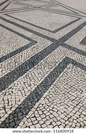 Portuguese traditional patterned cobblestones in Lagos Portugal