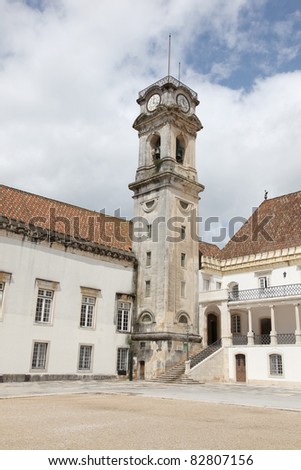 The main old university building and famous Clocktower at the University of Coimbra Portugal. The clock tower was constructed in the 18th century. The university was established in 1290