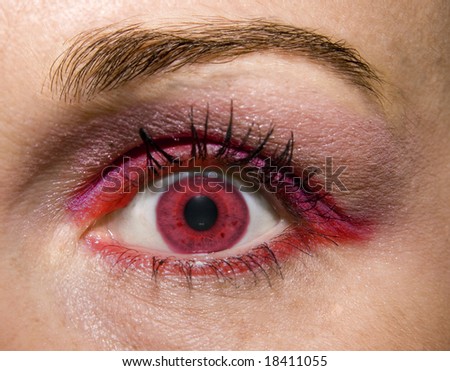 Red woman eye with red make-up