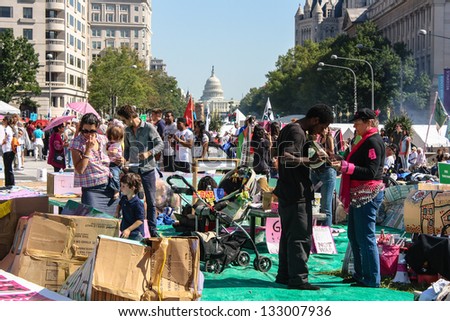 WASHINGTON D.C. - OCTOBER 8: Protesters march through the Nations capitol   during the 2011 Occupy movement on October 8, 2011 in Washington D.C.