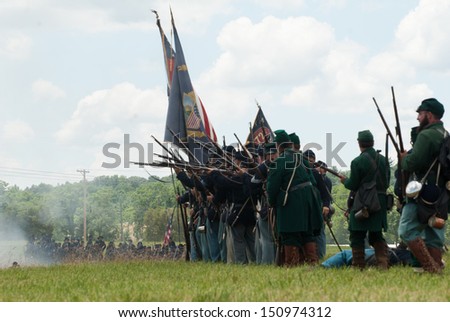 GETTYSBURG, PENNSYLVANIA - JULY 6: Union reenactors battle during the second day of the Reenactment of the 150th Anniversary of the Battle of Gettysburg in 2013.