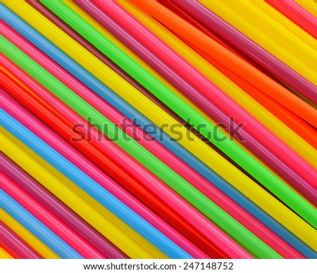 Background of Striped drink straws in different colors