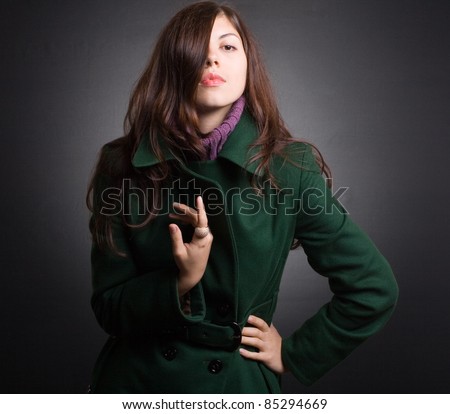 Portrait of a beautiful lady in an elegant coat