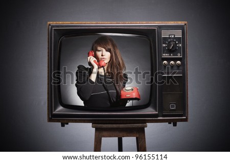 Retro TV on the screen says the young woman in a retro phone.