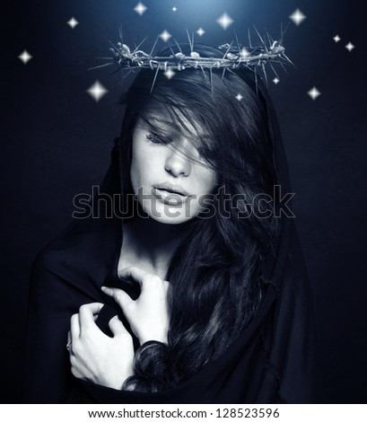 Praying woman in crown of thorns.
