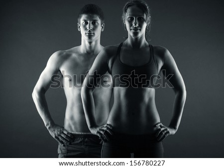 Man And Woman'S Torso Isolated On A Black Background