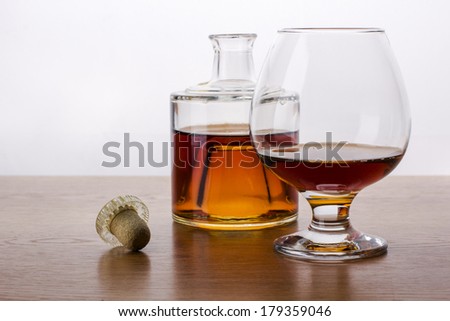 Cognac bottle and glass.