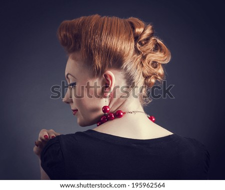Styled  Woman with Retro Golden Hair Style.