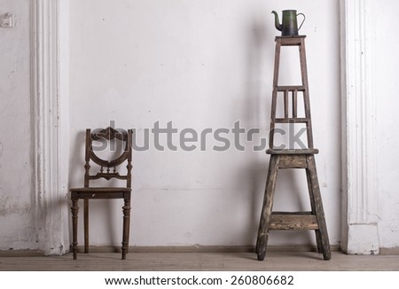 retro chair against a white wall.