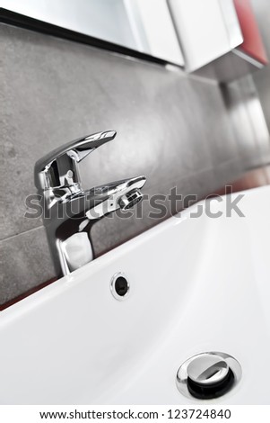 Bathroom white porcelain sink closeup