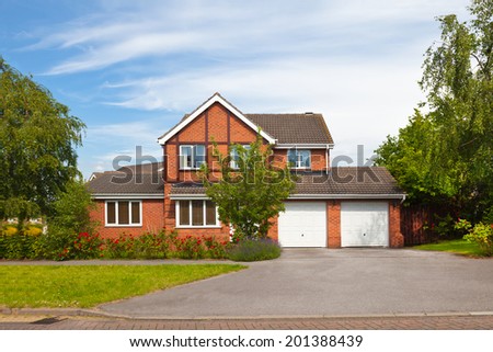 Detached house with garages