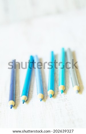 Pastel cool blue color pencils on white