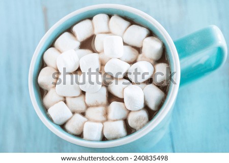 Close up winter beverage hot chocolate drink with mini marshmallows