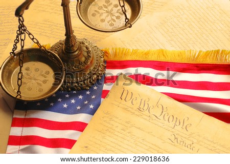 United States Constitution, scales of justice and American flag