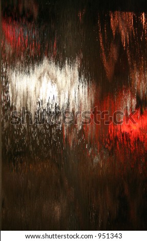 Water Flowing Down a Thick Piece of Glass Lit by Red and White Lights