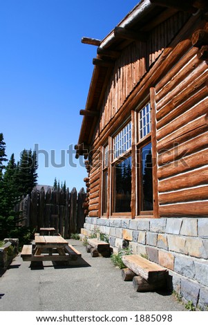 Log Wall of Lodge with Picnic Tables and Benches at Sunrise Area of Mt. Rainier National Park