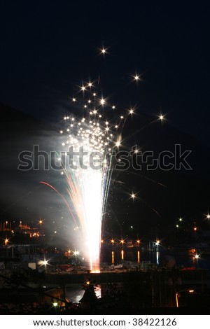 Fireworks Fountain Streams into the Night Sky over Small Town Wrangell Alaska