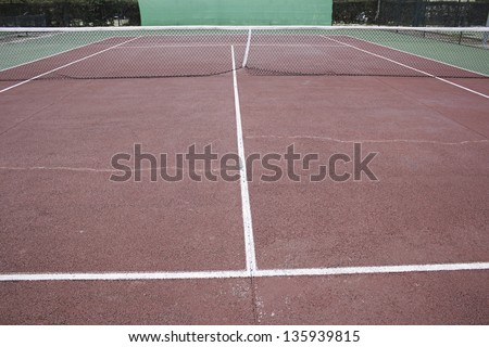 Tennis court with red floor fitness center, sport and fun