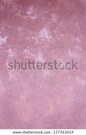 Mottled pink wall inside a home, decoration and construction