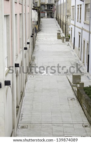 City street with tiles and building in an alley, building and architecture