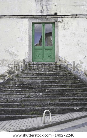 Door with stairs in urban street people, construction and architecture