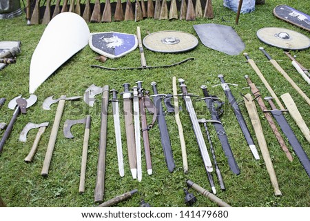 Swords and shields in medieval camp, historical reenactment of Spain