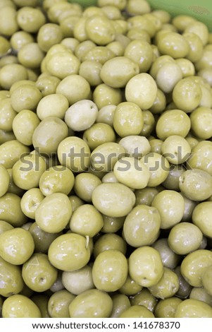 Pickled olives in market feed, food and snack