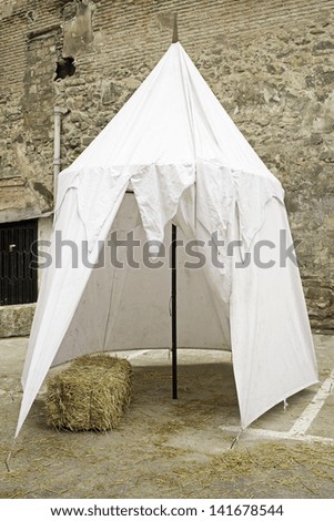 Medieval Tent urban street with straw, construction and recreation