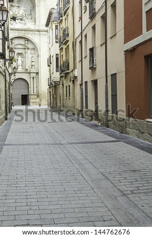 Alley city with modern buildings and cathedral, construction and architecture