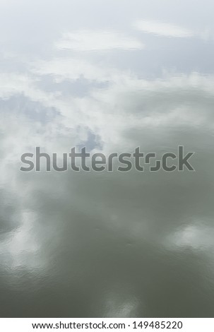 Sky reflected in sea water, station and cloudy, nature