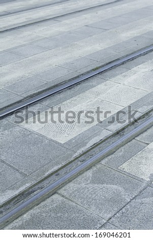 Tram rails in urban city, highway and street