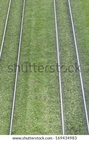 Rails on artificial grass tram, car and transportation
