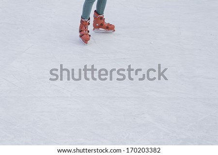 Skater on ice skating rink, sport and fun