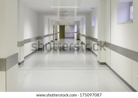 Empty hospital hall with white walls, medicine