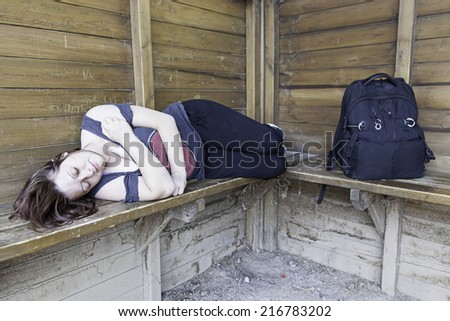 Girl resting on cabin bag, tour and outer