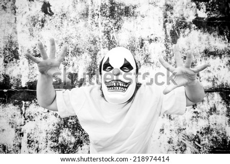 Crazy clown mask halloween costume and fear