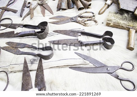 Cutting scissors and rusty iron wool business