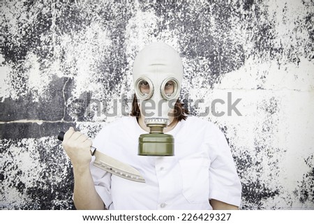 Gas mask girl with knife, danger and halloween