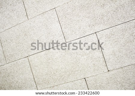 Horizontal cream tiles on urban land, construction