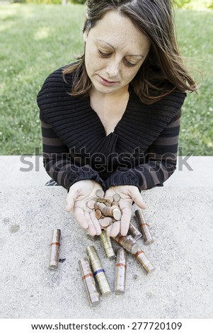 Woman with money coins, millionaire