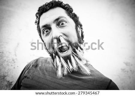 Bearded man hanging ears, hippie fashion