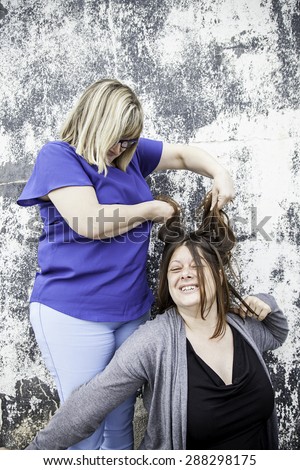 Woman pulling hair friend, fight and attack