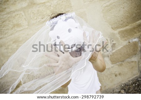 Bride with pig mask wedding celebration