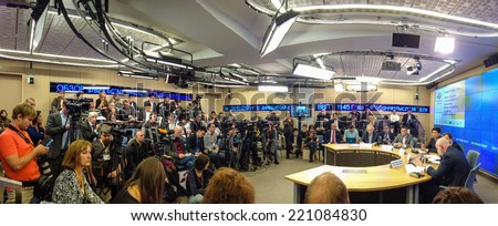 MOSCOW, RUSSIA - SEPT 30, 2014: Media journalists took part in remote TV bridge Moscow - Beijing at RIA Novosti devoted to joint Third annual Open Innovations Forum on Sept 30, 2014 in Moscow, Russia