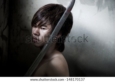 Asian man with sword of justice