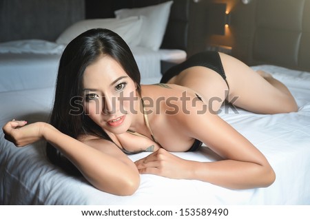 Sexy Bikini Girl On The Bed