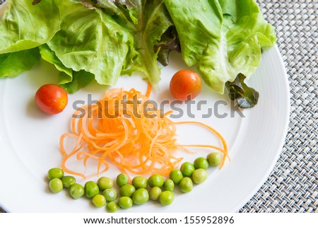 Vegetable salad in funny face style