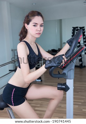 Young Girl doing indoor biking